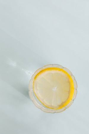Glass of fresh drink with lemon picture